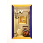 Mirror with vintage wooden frame.